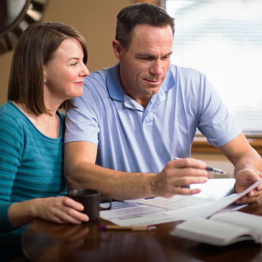 A couple examines their budget