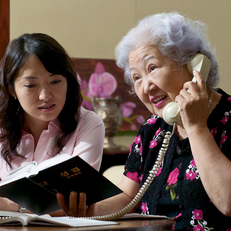 Two sisters witnessing by telephone.