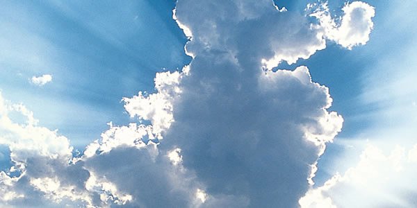 Sunlight shining through clouds.