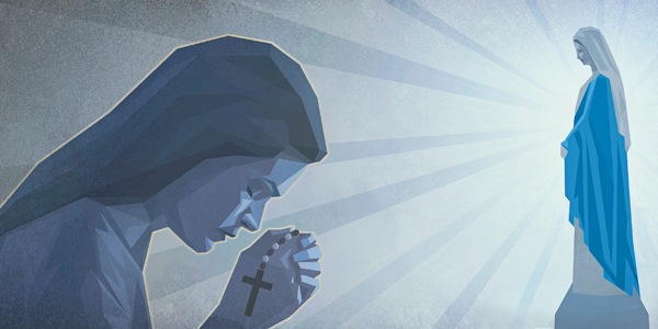 A woman holds rosary beads and prays to a statue of Mary