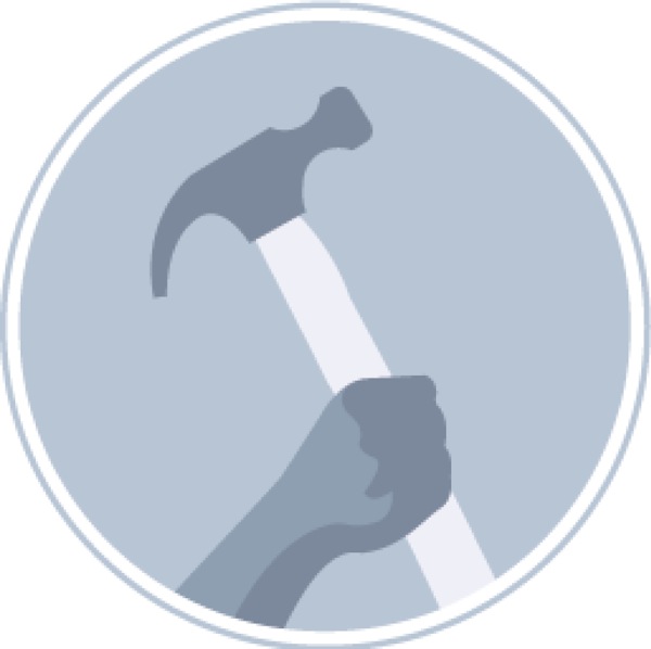 A hand holding a hammer