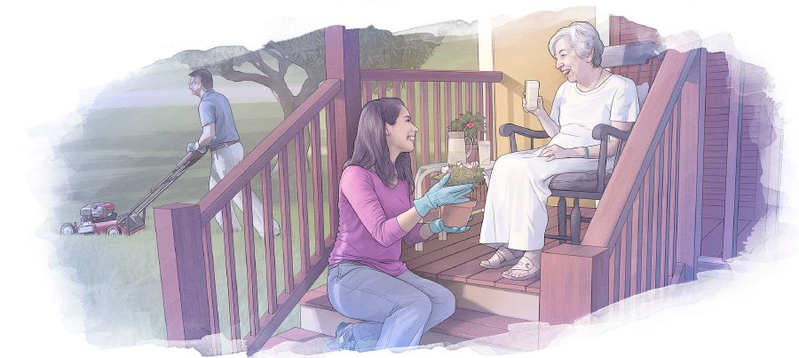 An older woman sits on a porch while younger people care for her yard