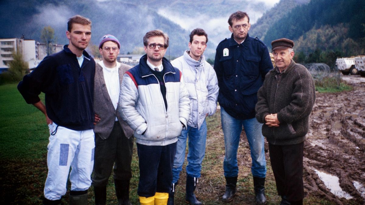 Peter standing with a group of brothers.