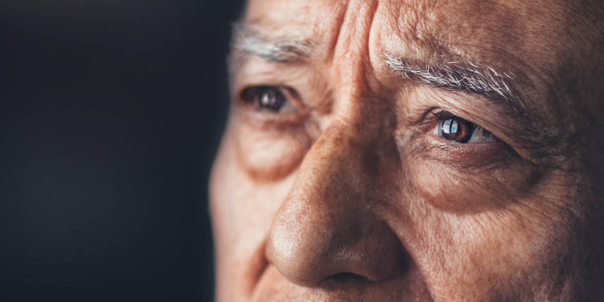 An older man looking worried.