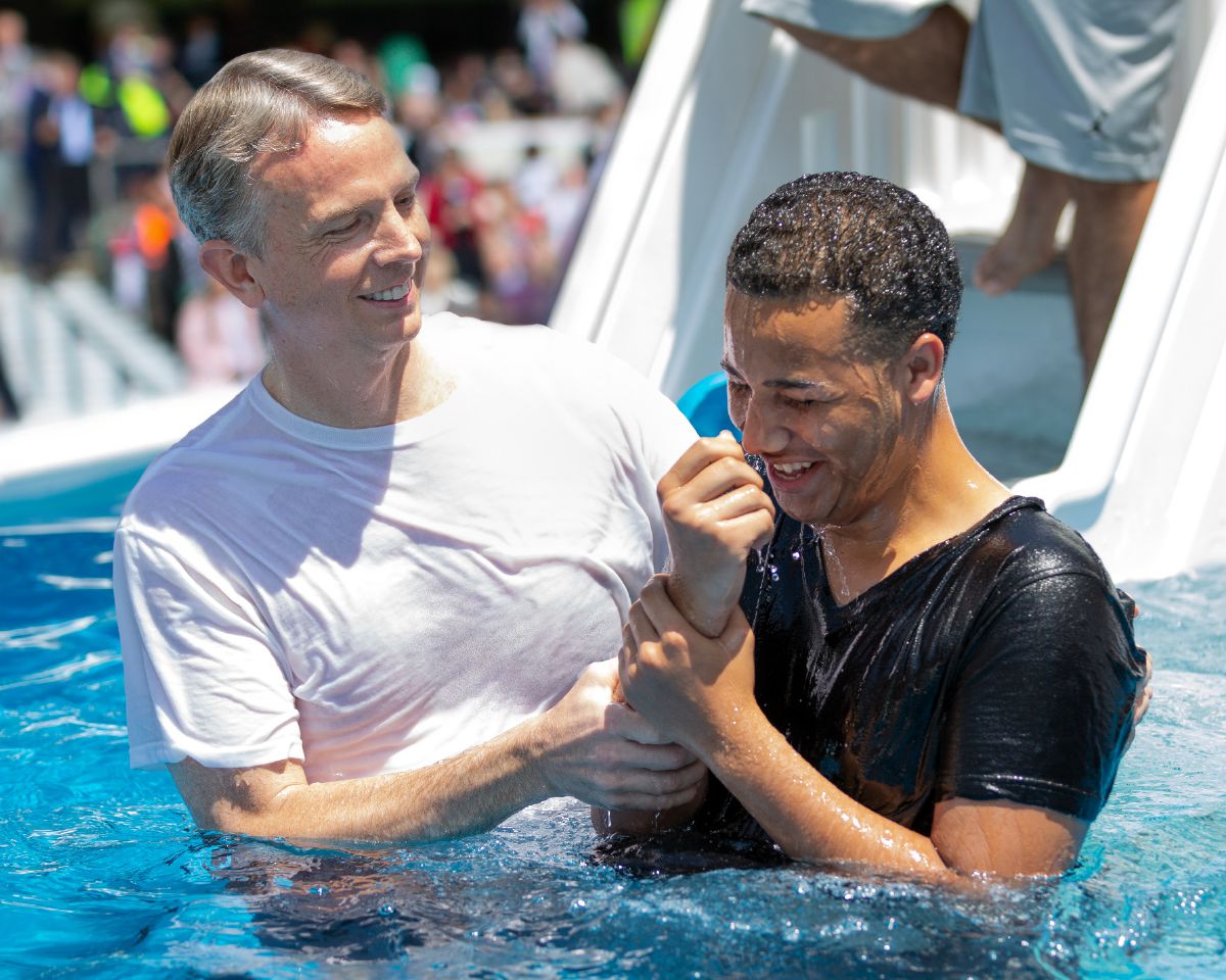 A man gets baptized