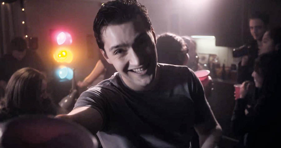 A scene from the video ‘Do Not Imitate Disloyal Ones.’ Nadia imagines a boy handing her an alcoholic drink at a wild party.