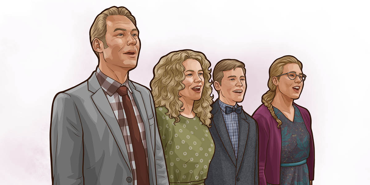 A family singing together at a meeting.