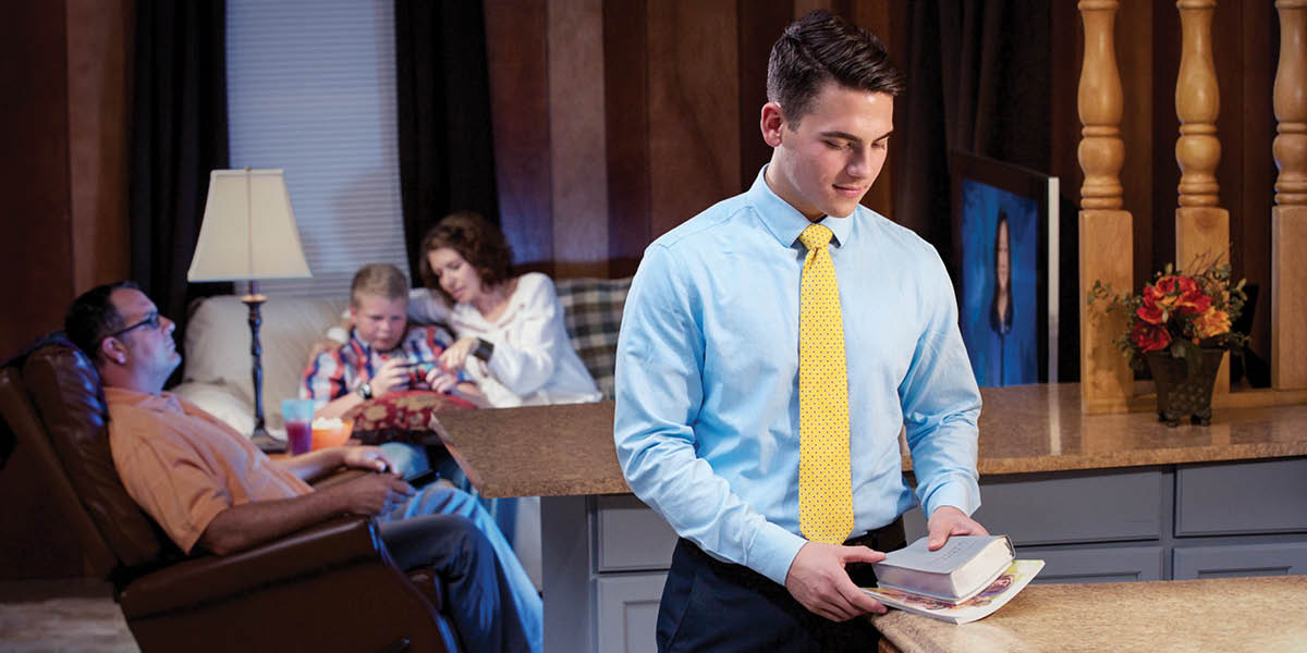 A young brother leaving for a Christian meeting while his unbelieving family relaxes at home.