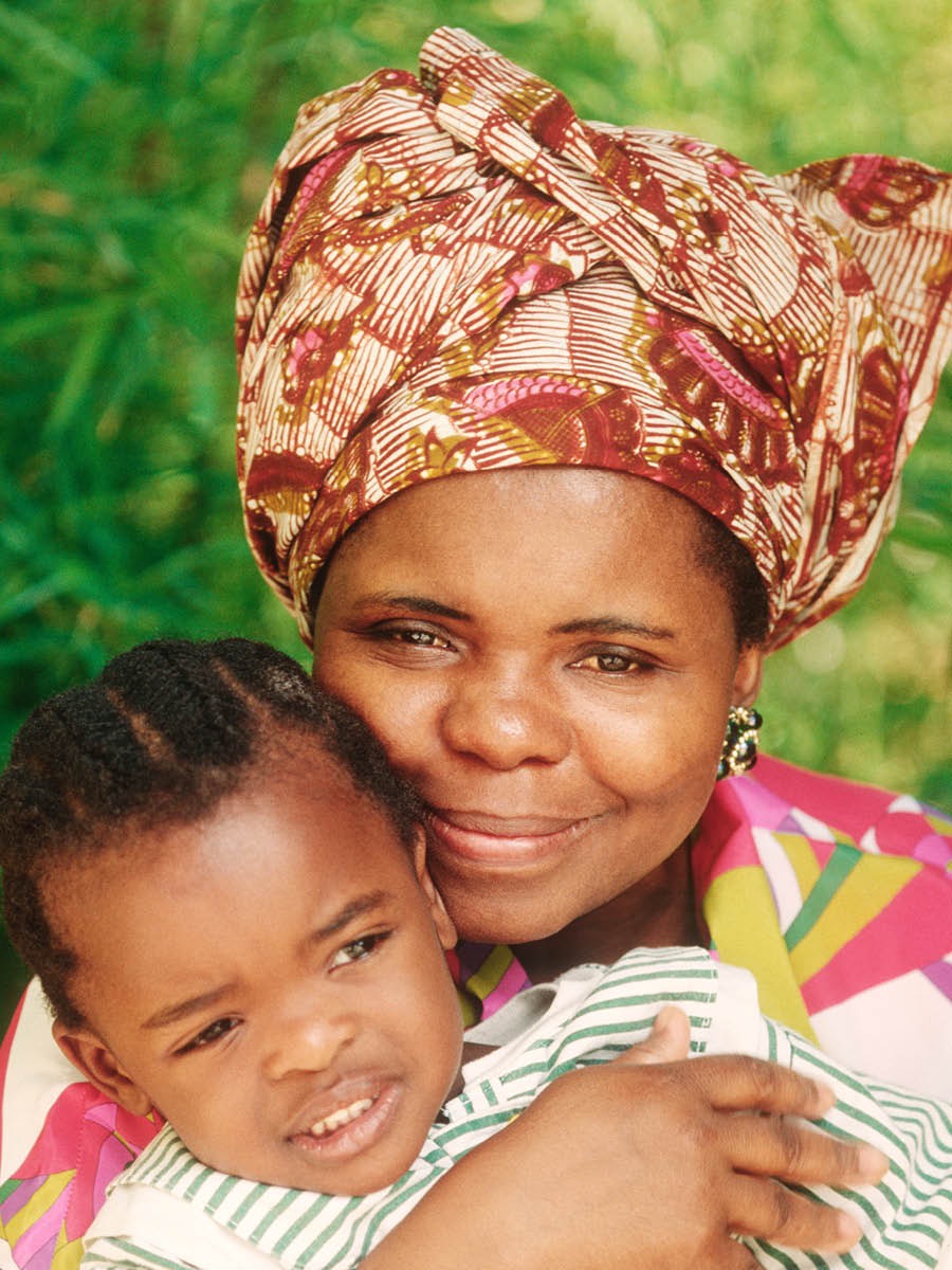 A mother holds her child