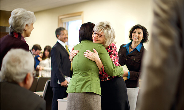 An inactive Christian sister is warmly welcomed back to the congregation