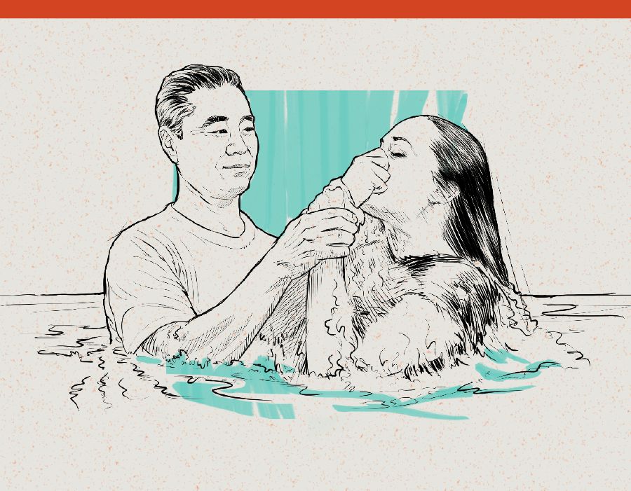 A woman getting baptized.