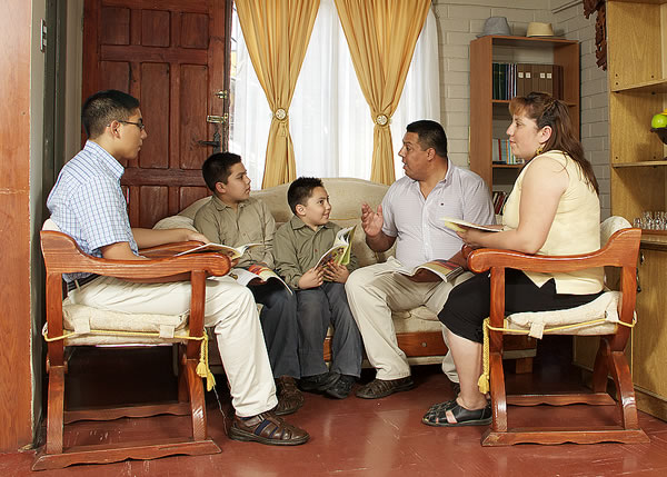 Victor conducting a family Bible study