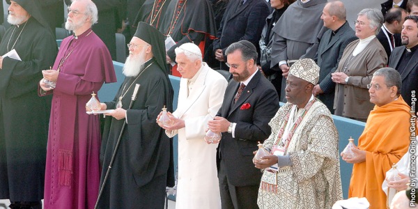 An interfaith gathering with various religious leaders in attendance, including the pope