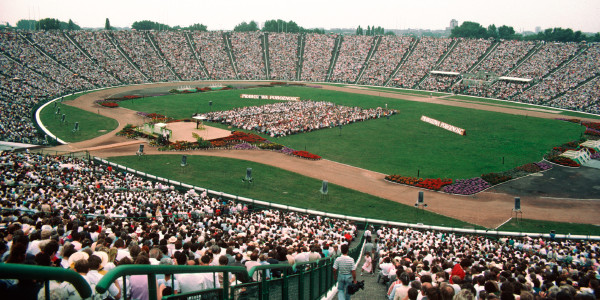 A district convention at a large stadium in Poland