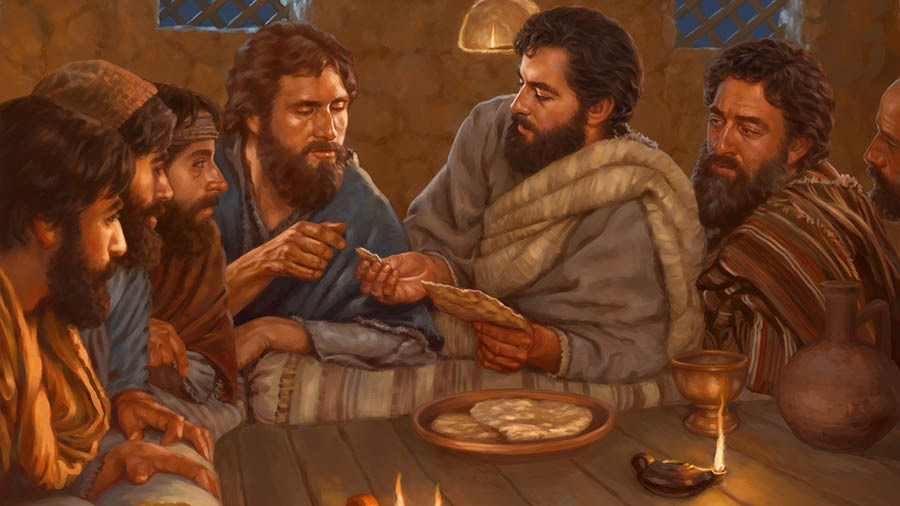 Jesus breaking a piece of bread and passing it to his apostles as they recline at a table.