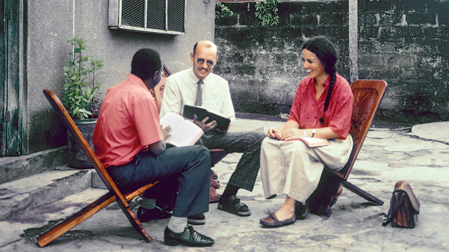 Martin and his wife, Ineke, conducting a Bible study with a man.