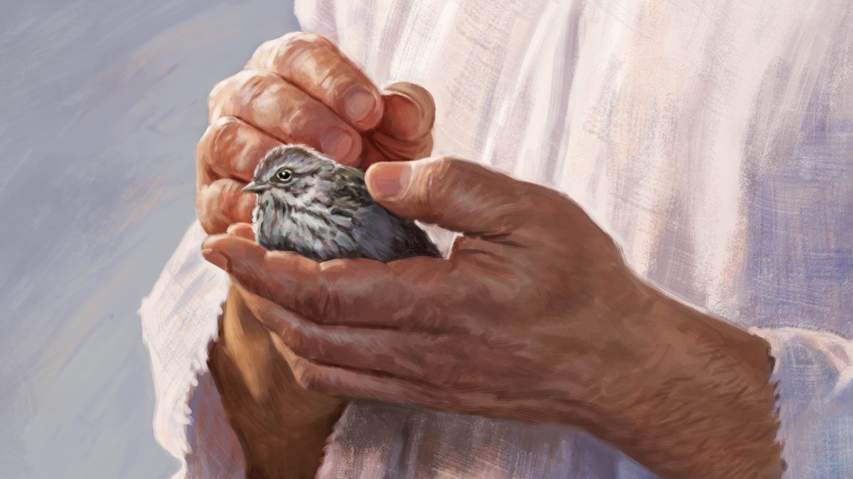 An Israelite man holding a sparrow in his hand.