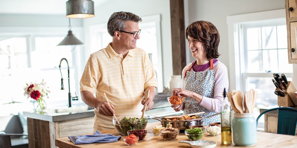 One of the scientists referred to earlier and his wife cook a meal together