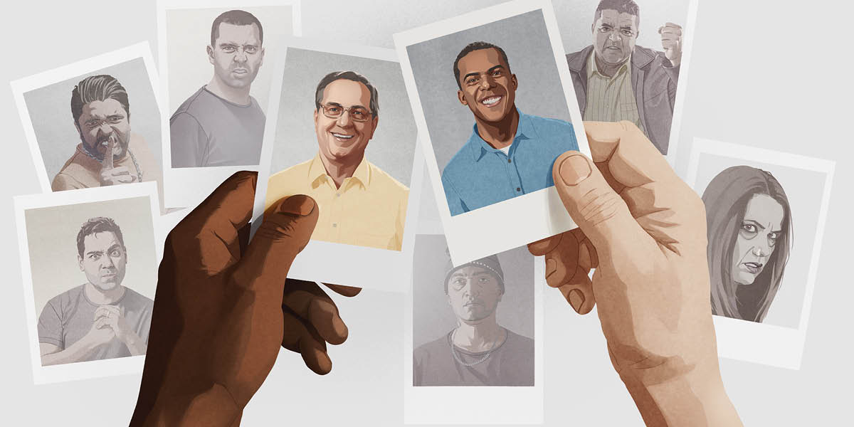A black man holding a photo of a smiling white man, and a white man holding a photo of a smiling black man. In the background are photos of angry people.
