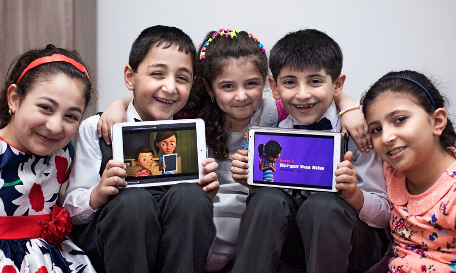 Kurdish children enjoy the Caleb & Sophia videos