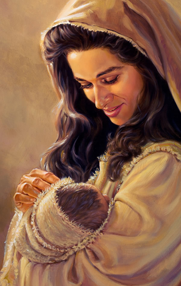 Una mujer con su bebé en brazos.