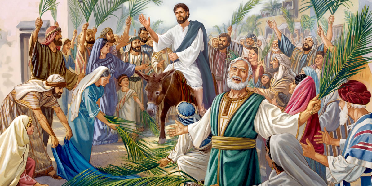 Jesús entra en Jerusalén montado en un burrito, y una multitud lo aclama como Rey
