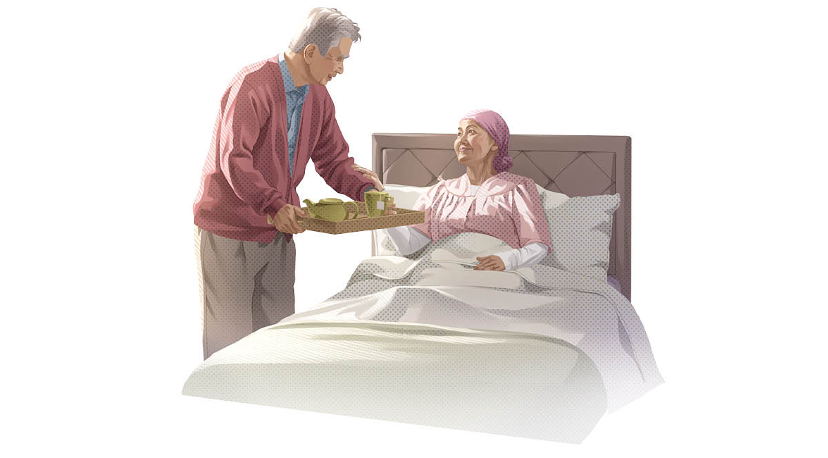 A husband bringing tea to his sick wife lying in bed.