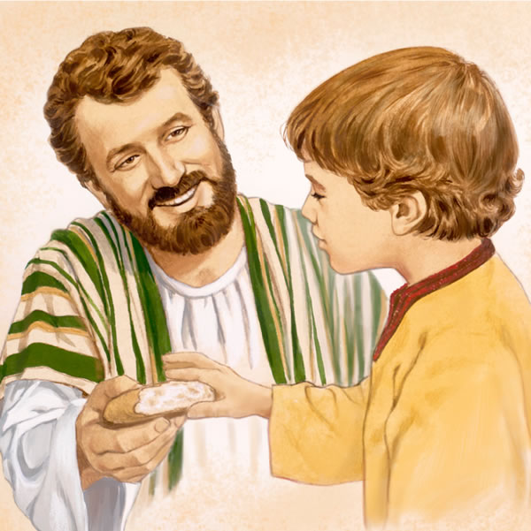 Un padre dà un pezzo di pane al figlio