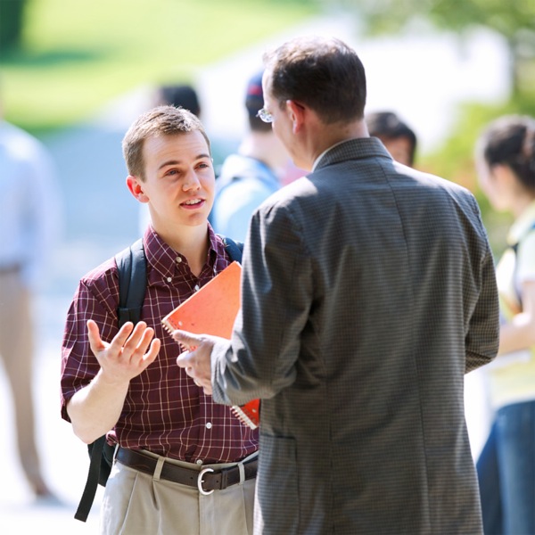 A student explaining his beliefs to his teacher