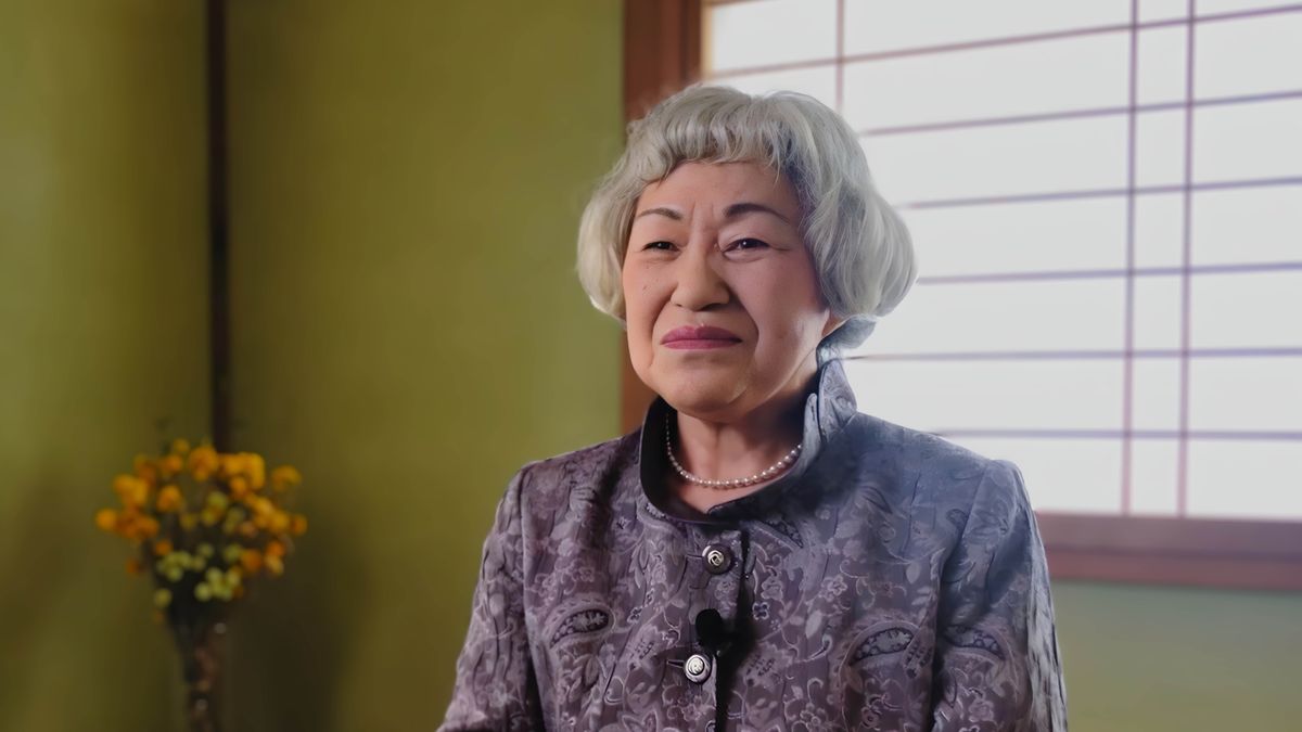Bualu bua mu filme wa “Mu batshimunyi ba mvita ya ditabuja​—Mudi badi ne bena dibaka nabu kabayi bena kuitabuja.” Muanetu wa bakaji Hideko Sasaki Ito.