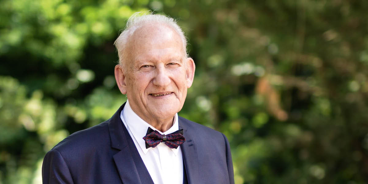 Ta̱ René Ruhlmann.