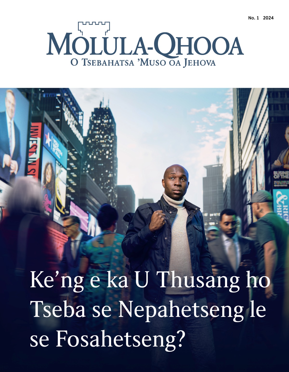 Mohlankana o eme toropong e sephethephethe. Batho ba merabe e fapaneng ba feta pel’a hae. O shebile holimo joalokaha eka o batla tsela.