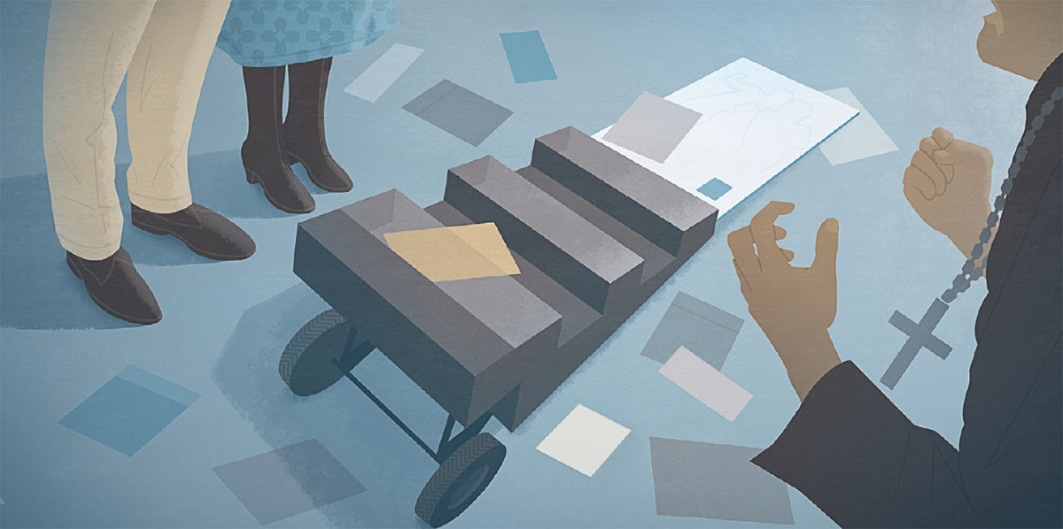 Saurang pendéta nyieun bacaan dina rak roda pabalatak, sapasang Saksi di gigireunana tetep kalem