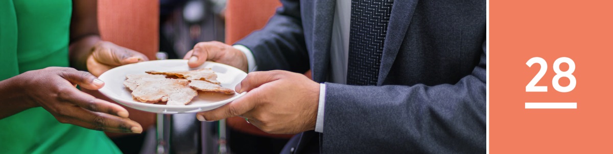 Lession 28. Le persone le ze drio passar un piato con pan sensa levà nela Sena del Signor.