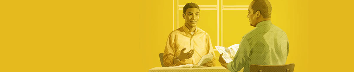 Seorang pemuda sedang belajar Bible dengan Saksi-Saksi Yehuwa.